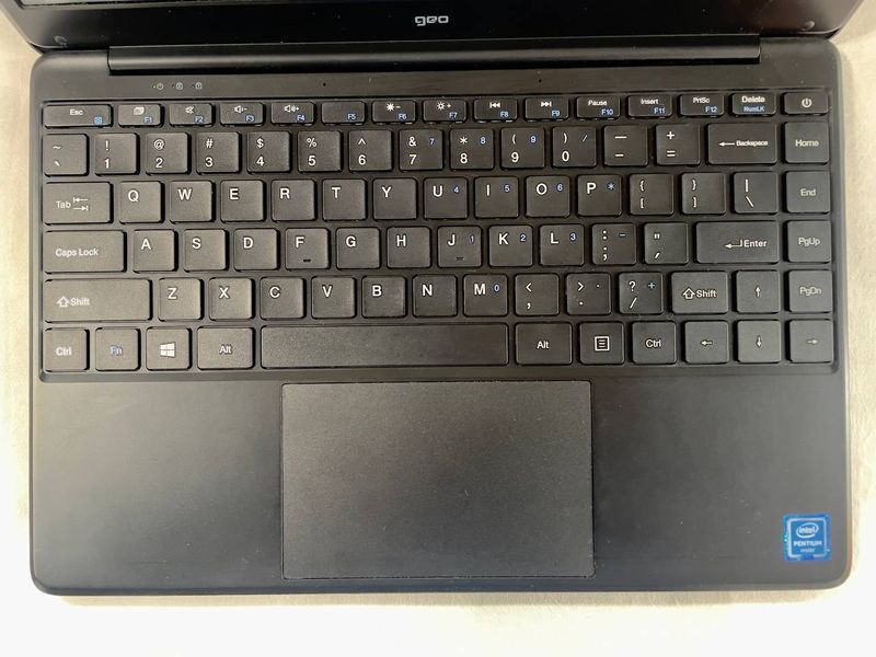 Ультрабук Geo GeoBook 240 14.1" FHD IPS(1920x1080) TN / intel Pentium Silver N5030(4 (8) ядра по 2.4 - 3.0 GHz) / 8 GB DDR4 / 256 GB SSD / Intel UHD Graphics 605 / WebCam / Win 10 б/в 3391205 фото