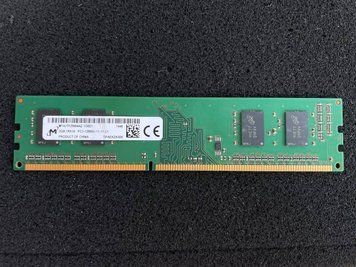 Модуль пам'яті Micron 2GB 1Rx8 PC3-12800U-11-11-C1 (MT4JTF25664AZ-1G6E1) Б/В 301192027 фото